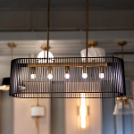 Люстра подвесная овальной формы с металлическим решетчатым абажуром матово-черного цвета и 5 лампами Kichler варинант исполнения - 7 | Loft Concept в Костроме